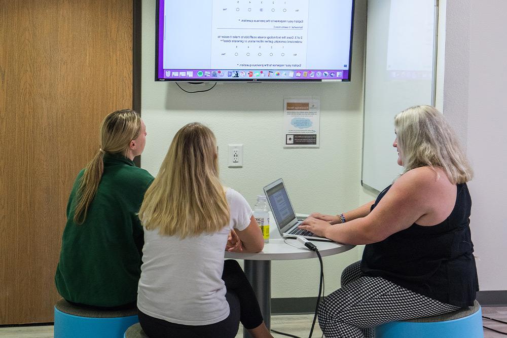 Students learn about technology in the classroom in CUI’s Smart Classroom.